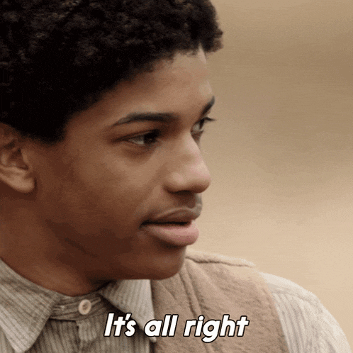 a young man says " it 's all right " in a close up