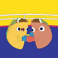 two tacos are boxing in a ring with gloves on