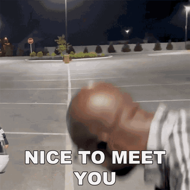 a man in a parking lot with the words nice to meet you above his head