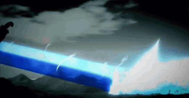 a person is holding a blue sword in their hand