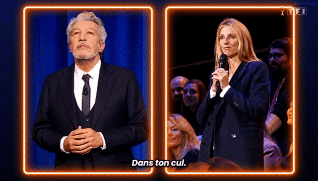 a man in a suit and tie stands next to a woman holding a microphone with the words dans ton cul written on the corner