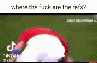 where the fuck are the refs ? a video of a person wearing a red hat on a green screen .