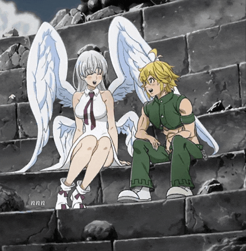 a man and a woman are sitting on a set of stairs with the letters nnn on the bottom right