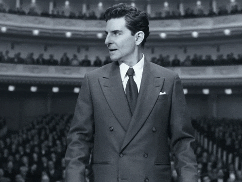 A Young Leonard Bernstein About To Conduct An Orchestra Maestro GIF - A Young Leonard Bernstein About To Conduct An Orchestra Maestro Bradley Cooper GIFs
