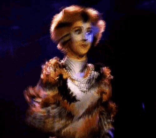 a blurry picture of a woman dressed as a tiger