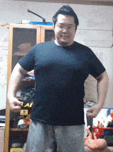 a man in a black shirt stands in front of a cabinet that says nintendo on it