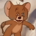 a close up of a cartoon character , jerry mouse , smiling .