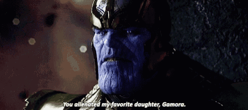 a close up of thanos talking to gamora in a movie .