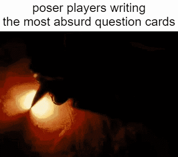 a picture of a person writing question cards with the caption poser players writing the most absurd question cards
