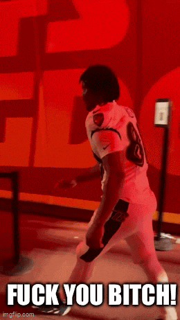 a gif of a football player with the words " fuck you bitch " at the bottom