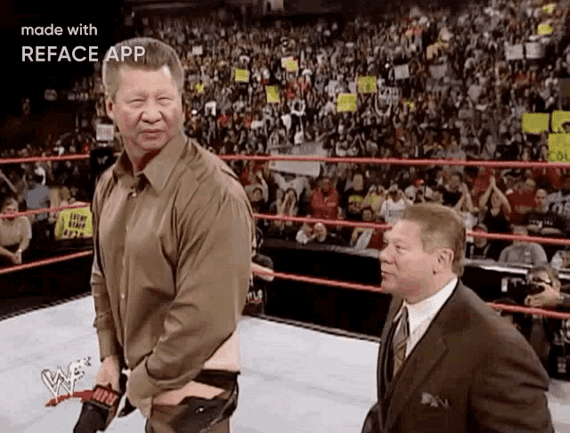 two men are standing in a wrestling ring with a reface app watermark on the bottom
