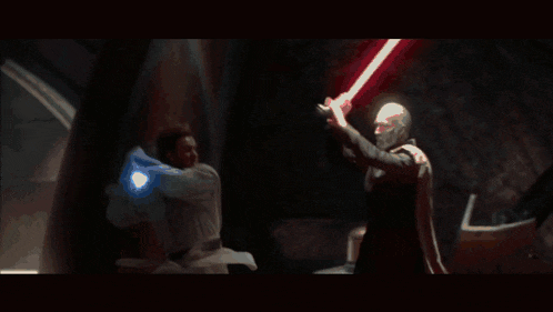 two men are fighting with lightsabers and one of them is glowing