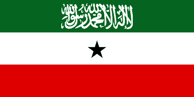 a green white and red flag with arabic writing