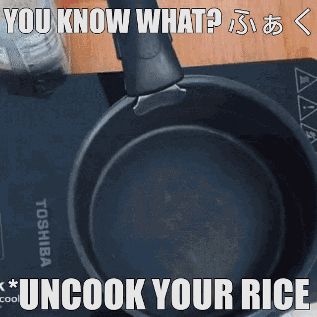 a frying pan sitting on top of a toshiba induction stove