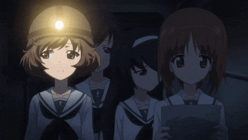 a group of anime girls standing in a dark room with one wearing a helmet