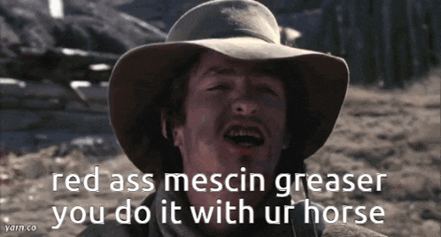 a man wearing a cowboy hat with the words red ass mescin greaser you do it with ur horse