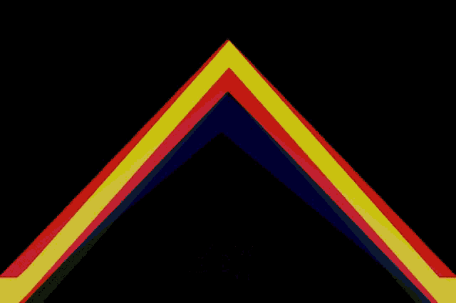a rainbow colored triangle with the word aed irn written below it