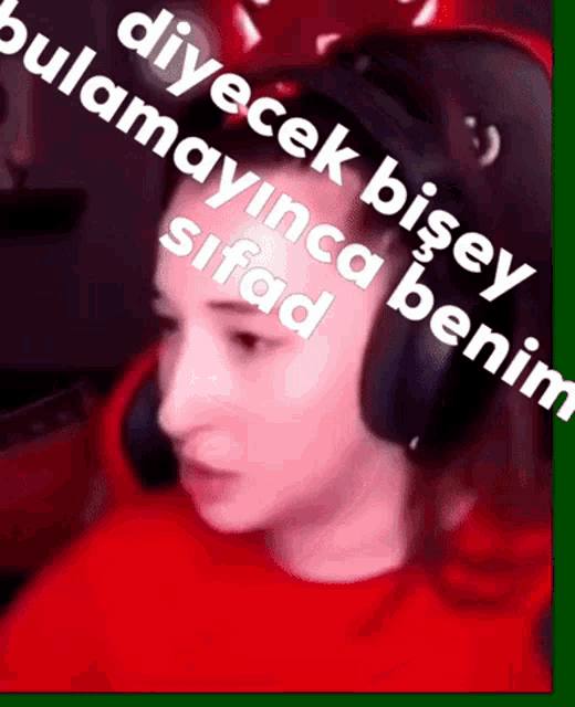 a woman wearing headphones and a red shirt says " diyecek bisey sifad " on the bottom