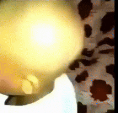 a blurred image of a cow print shirt with a light shining on it