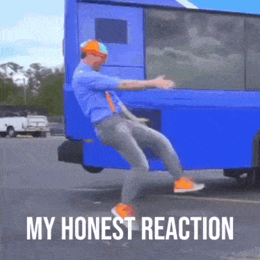 a man is dancing on the back of a blue bus with the words my honest reaction written below him .