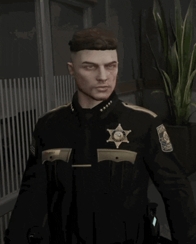 a man in a sheriff 's uniform has a badge that says sheriff 's office
