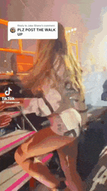 a tiktok video of a woman sitting on a chair with a reply to jake shane 's comment