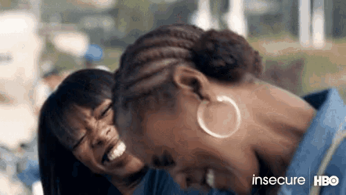 two women are laughing in a scene from the tv show insecure