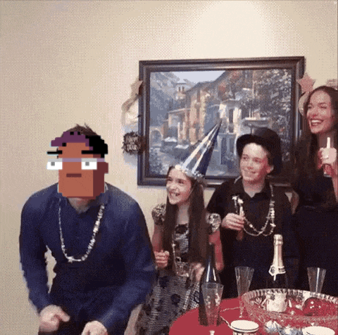 a group of people are celebrating a new year 's eve party with a man wearing a pixelated face
