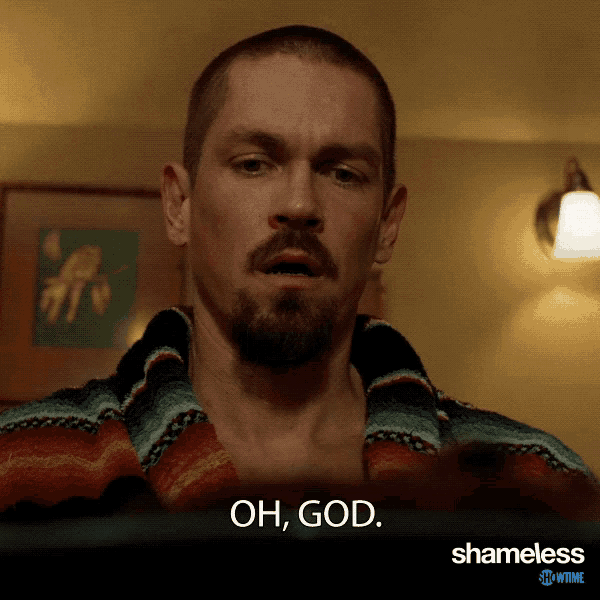 a man with a beard is wearing a blanket and says oh god