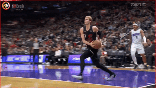 a basketball player with the number 1 on his jersey dribbles the ball