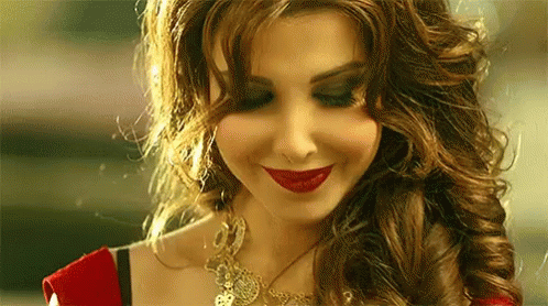 نانسي عجرم GIF - Nancy Ajram Smile Dance GIFs