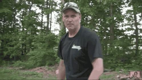 a man wearing a black t-shirt that says liberty on it