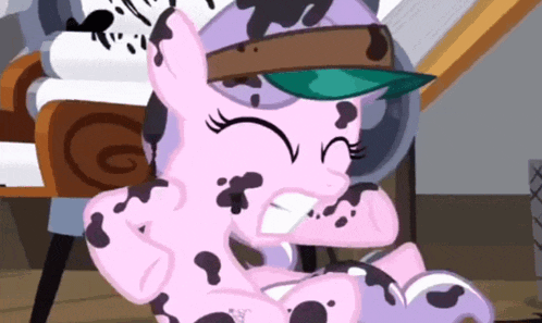 a cartoon pony with black spots on its body