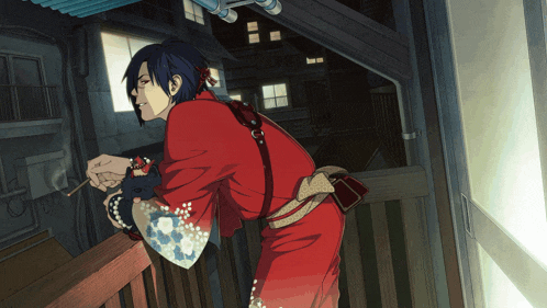 a man in a red robe smoking a cigarette on a balcony
