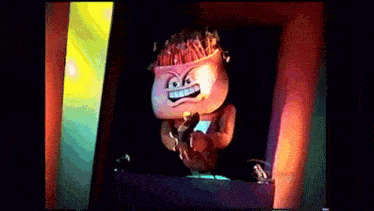 a cartoon character is holding a microphone in front of a sign that says ntv