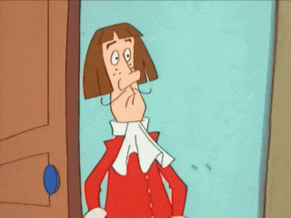 a cartoon character is standing in front of a door with his hands on his hips