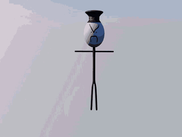 a blue object with a red and white hat on it