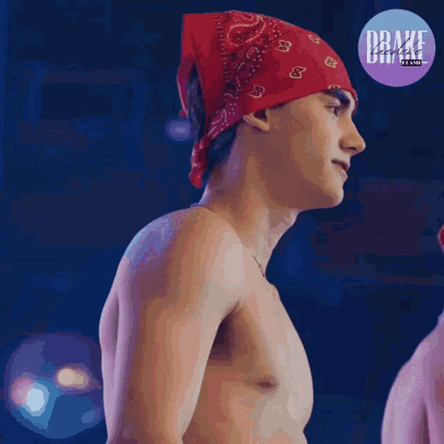 a shirtless man wearing a red bandana with drake on the bottom