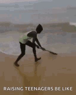 a man is riding a wave on a surfboard on the beach with the words `` raising teenagers be like '' .