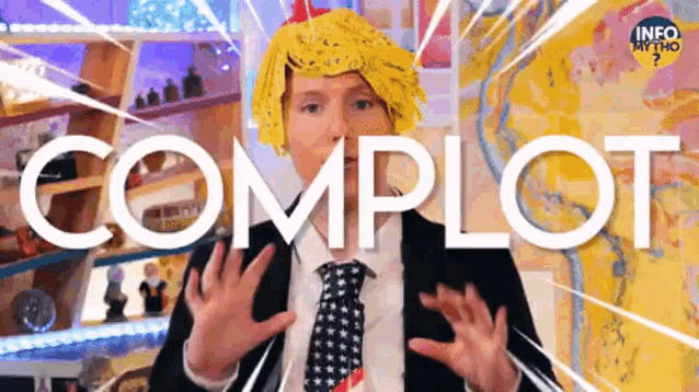 a man in a suit and tie is standing in front of a sign that says complet