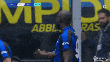 a soccer player wearing a jersey that says ebay
