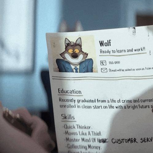 a person is holding a resume for wolf with a picture of a wolf on it