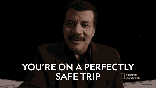 a national geographic ad with a man in a suit
