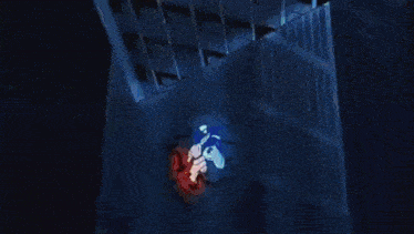 a close up of a person 's hand with a blue background .