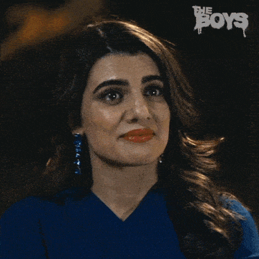 a close up of a woman 's face with the boys written on the bottom