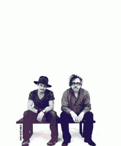 a poster for charlie and the chocolate factory with two men on a bench