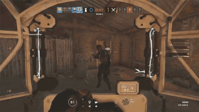 a video game screen shows a round 2 won by blue team