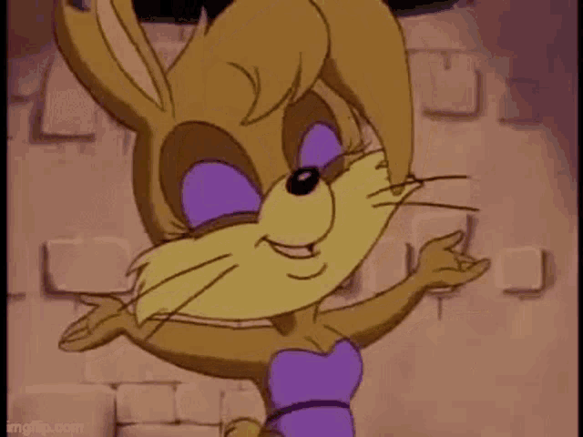 a cartoon rabbit is standing in front of a brick wall .