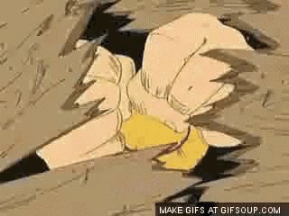 a cartoon character is laying on the ground with a yellow shirt on .