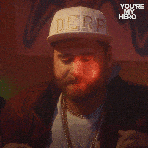 a man is wearing a hat that says derd on it
